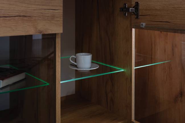 Тумба ТВ Арчи 10.85 цвет дуб крафт золотой/камень тёмный, есть подсветка за стеклом по торцу полки Тумба ТВ Арчи 10.85 цвет дуб крафт золотой/камень тёмный, есть подсветка за стеклом по торцу полки